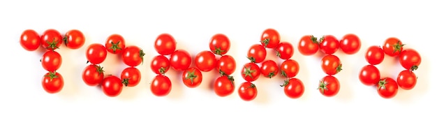 The word "Tomato" written with fresh cherry tomatoes, isolated on white