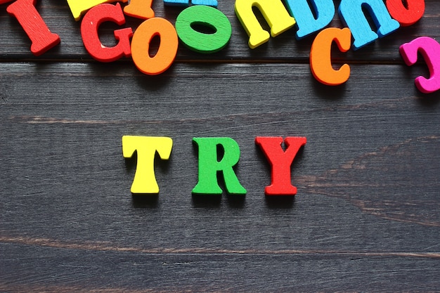 The word try with colored letters