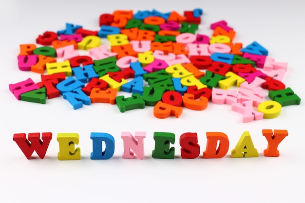 The word wednesday with colored letters