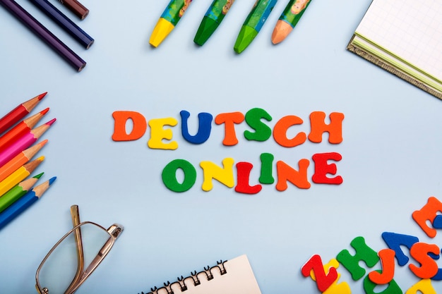 Words deutsch online made of colored letters. Learning a new language concept