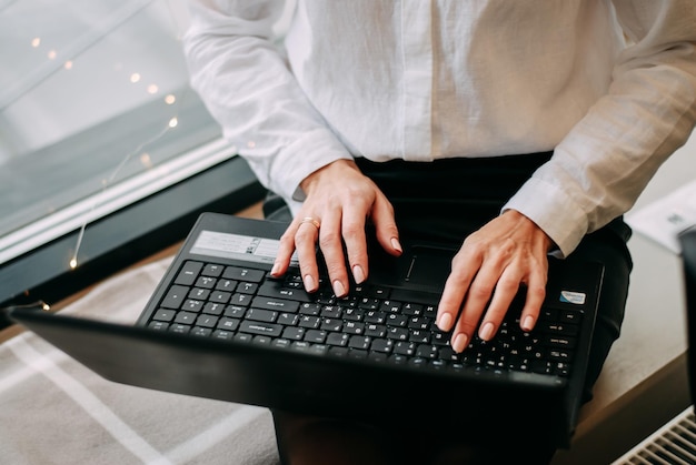 work on a laptop portable computer business girl a cup of coffee business work