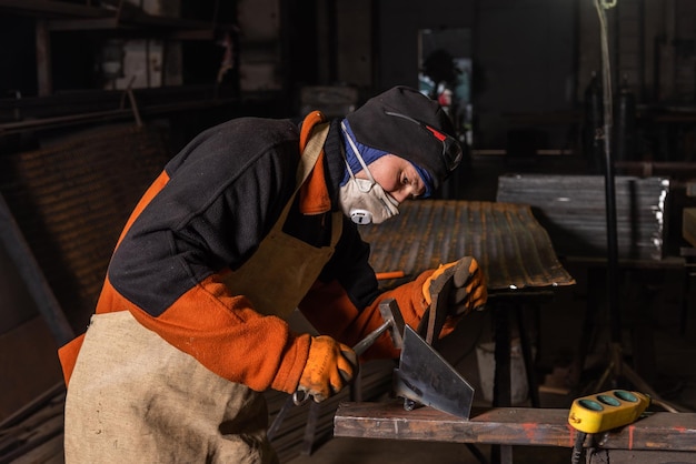 Work in a mechanical workshop with various tools