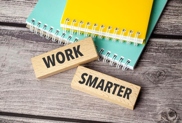 Work Smarter words on wooden blocks and colourful notepads