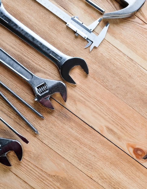 Work tools on a wooden floor. Construction concept.