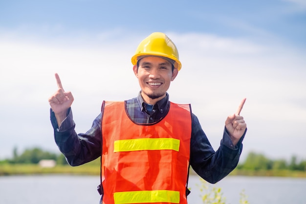 Worker construction concept Asian Worker construction smile happy standing outdoor on site construction