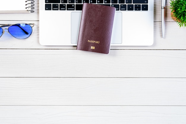 The worker and employee desk has trip dreaming and preparing to journey 