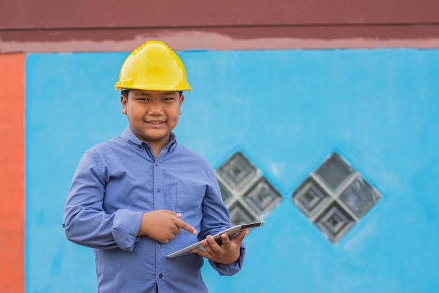 Worker Engineer smile happy in work using tablet technology