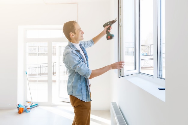 Worker setting up a window