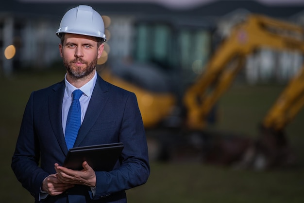 Worker in suit and helmet Investor civil engineer construction manager Construction building