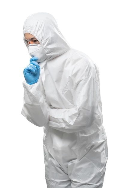 Worker wears medical protective suit or white coverall suit with mask and goggles