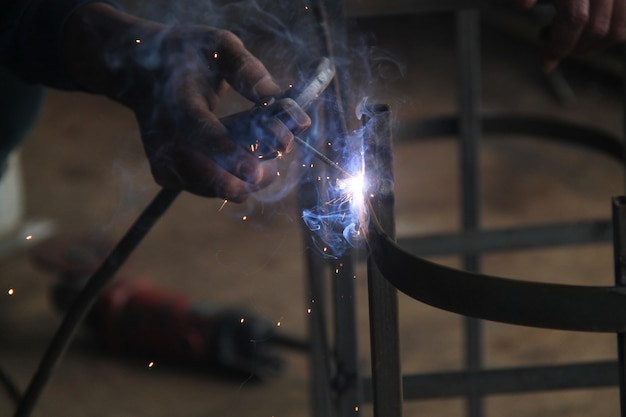 worker welding the steel