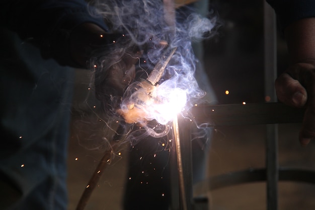 worker welding the steel