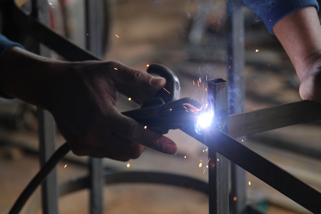 worker welding the steel