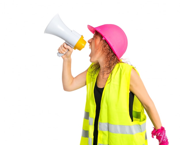 Worker woman shouting over isolated white background