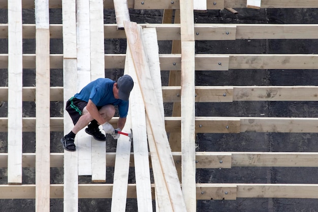 Workers building roof