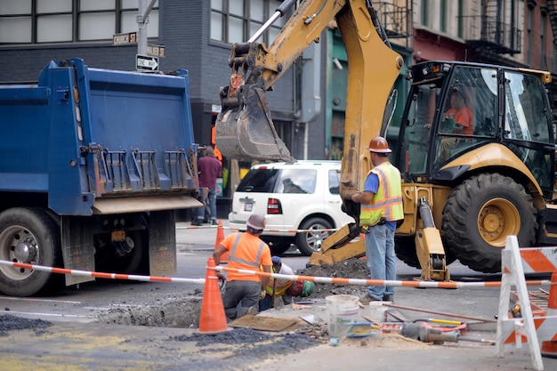 Workers at construction site in city