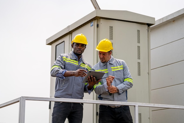 Workers installing solar panels for efficient energy in the city