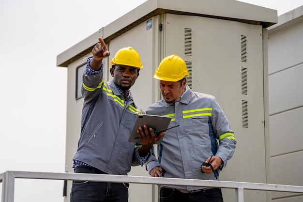 Workers installing solar panels for efficient energy in the city