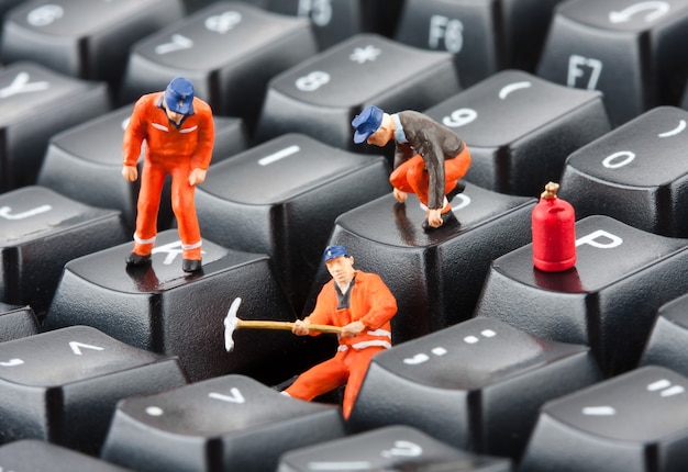 Workers repairing keyboard