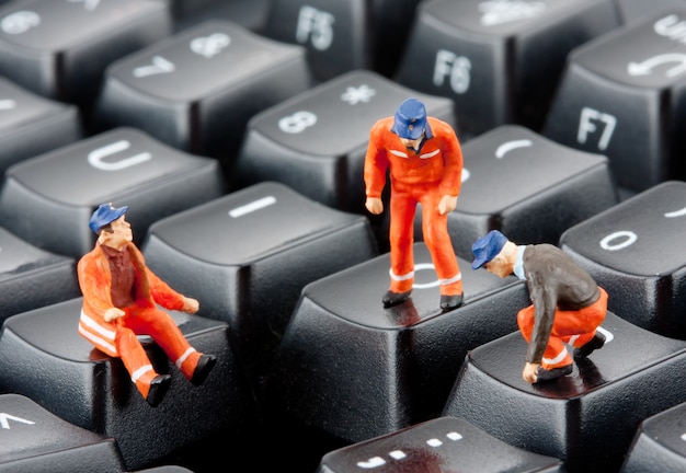 Workers repairing keyboard