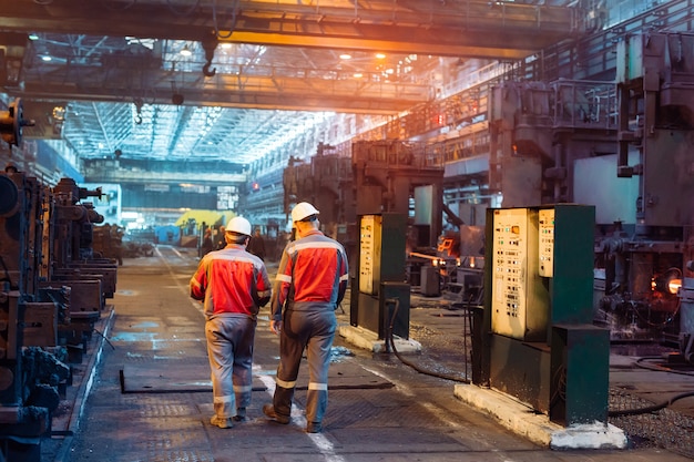 Workers in the steel mill.