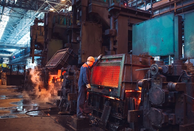 Workers in the steel mill.