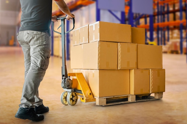 Workers Unloading Packaging Boxes on Pallets in Storage Warehouse Shipment Boxes Supplies Warehouse