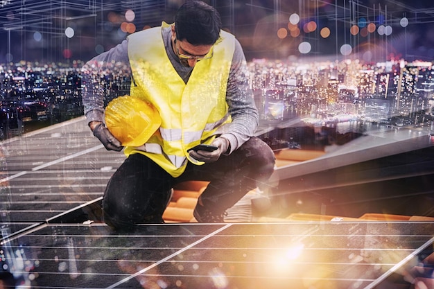 Workers verify energy system with solar panel with a phone