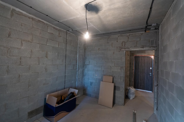 Working process of installing metal frames for plasterboard -drywall - for making gypsum walls in apartment is under construction, remodeling, renovation, extension, restoration and reconstruction.