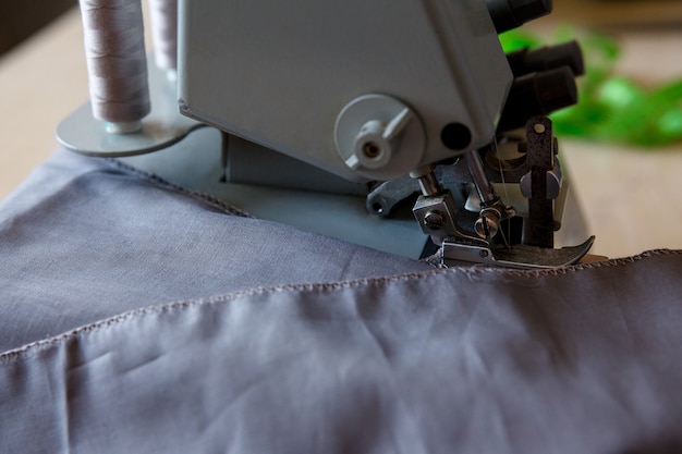 The working process. Overlock foot and fabric