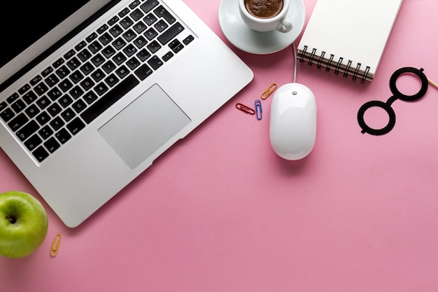 Working Space Business Freelance Concept Top View Above Flat Lay Laptop. Pink Background.