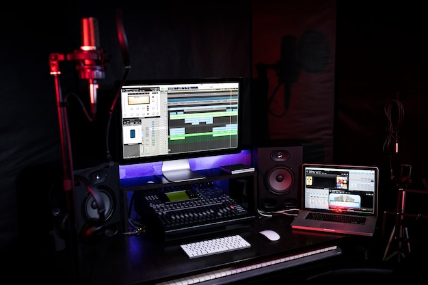 The workplace in the recording studio with computer, mixer and volume for DJ or songwriter to create a new music