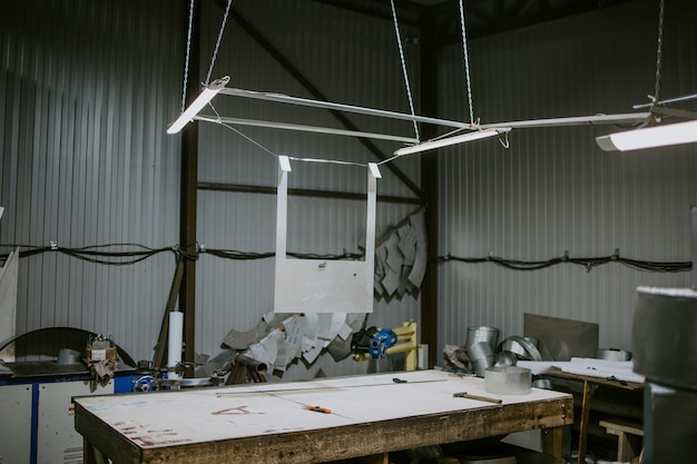 Workshop table with tools for working with metal