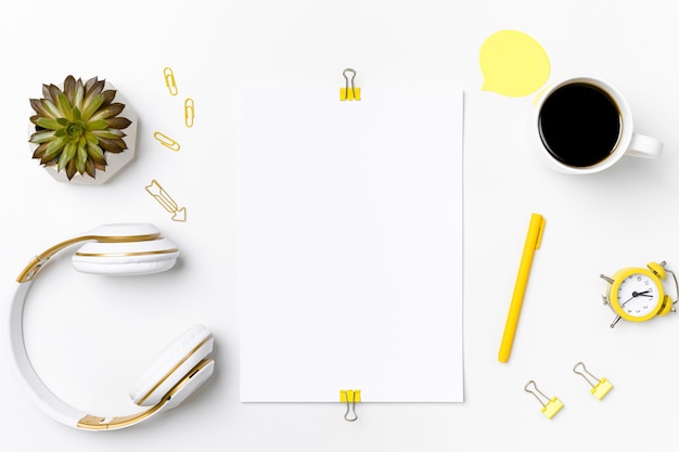 Workspace mockup with blank paper and stationary