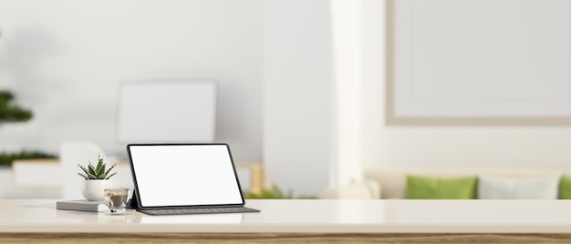 Workspace tabletop with tablet screen mockup and copy space over blurred white living room