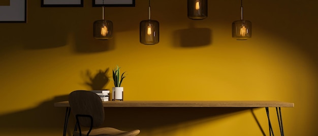 Workspace with copy space on wooden tabletop with decor against stylish yellow wall background