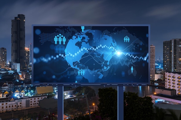 World planet Earth map hologram and social media icons on billboard over night panoramic city view of Bangkok Southeast Asia Networking and establishing new connections between people Globe