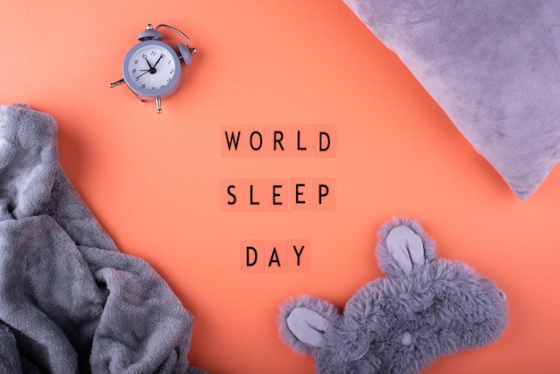 Photo world sleep day concept with alarm clock