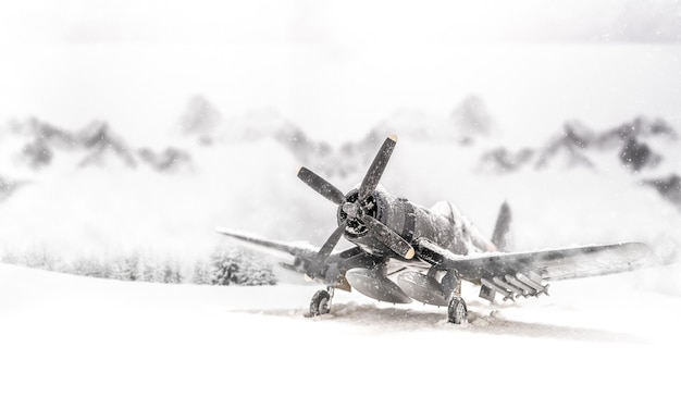 World war II military aircraft with heavy snowfall