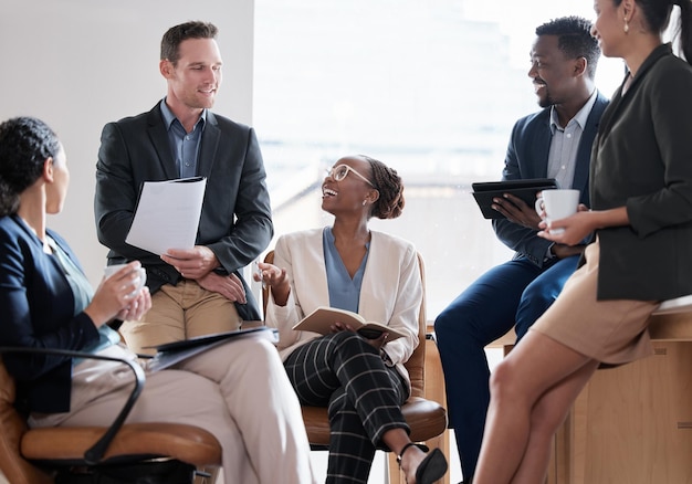 Would you like to say something Shot of a group of businesspeople in a meeting at work