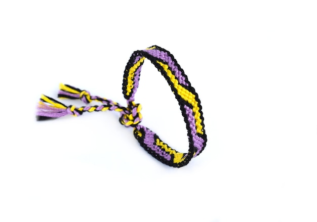 Photo woven diy friendship bracelets handmade of embroidery bright thread with knots on white