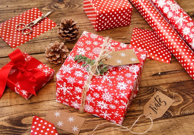 Wrapped Christmas present on a wooden table