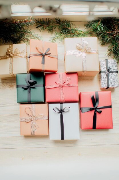 Wrapped Gifts on White Wooden Background