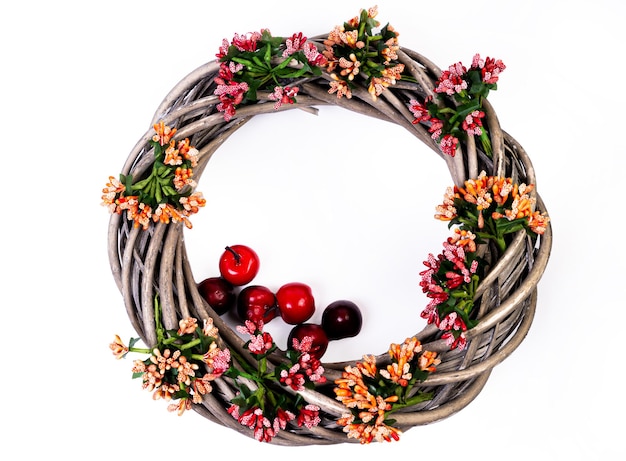 Photo wreath woven from the branches of the vine isolated place for text