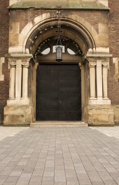 Wrought iron door with a columns at the entrance to the cathedral