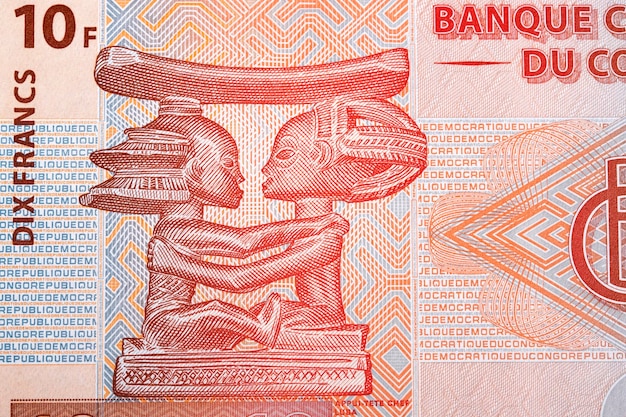 X9Luba carving TeteaTete from Congolese franc