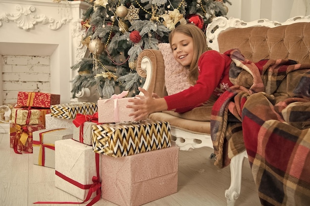 Xmas online shopping Christmas is the time to please Family holiday Happy new year Winter The morning before Xmas Little girl Christmas tree and presents Child enjoy the holiday