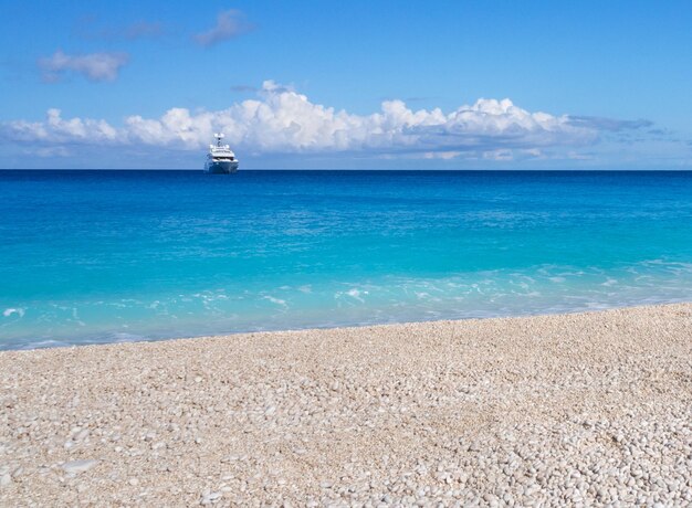 Yacht in the background of clouds on the island of Kefalonia in the Ionian Sea in Greece