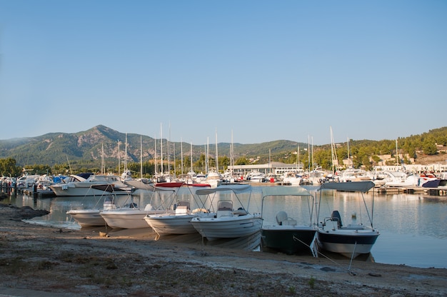 Yacht club at sunset, parking for boats