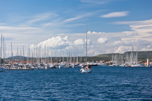 Yacht is entering in Rogoznica town in Croatia